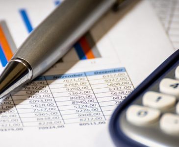economics-calculator-pen economics-calculator-pen